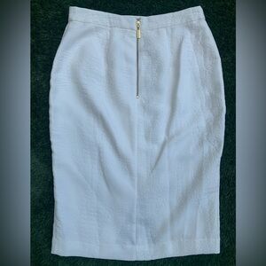 JENNIFER LOPEZ white faux animal skin pencil skirt and gold zipper